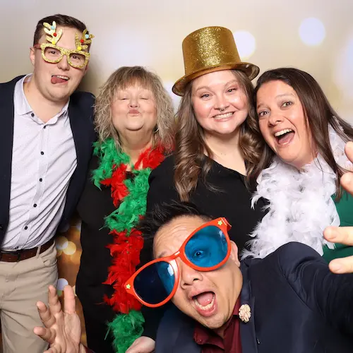 Guests enjoying the holiday photo booth